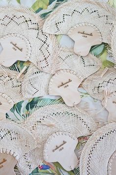 some white doily with flowers and leaves on it's sides, as well as the words i love you written on them