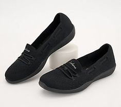 A sporty style to get you moving in the morning, these sweet slip-ons make a cute and comfy option for everyday wear. Plus, you can toss them in the wash when they get a little dirty. From Skechers. Black Slip Ons, Fashion Outlet, Sporty Style, Slip Ons, In The Morning, Slip On Shoes, The Morning, Comfortable Shoes, Black Shoes