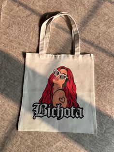 Bichota  Tote - Made with love - Ships within 1 to 3 business days Just like you each item is unique and two are alike Please note that all items are handmade and some imperfections might occur Free shipping for the United States International shipping fees apply - Please contact us for rates Trendy Bag With Graphic Print For Gift, Trendy Bags With Graphic Print For Gifts, Trendy Graphic Print Bag As Gift, Trendy Graphic Print Bag For Gifts, Trendy Personalized White Bags, Trendy White Personalized Bags, Personalized Trendy White Bags, Trendy Personalized Bags, Graphic Print Tote Shoulder Bag As Gift