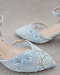 "Classic and elegant lace almond toe block heel with added flower appliques. Perfect for weddings, parties, or any special occasion. DETAILS: HEEL HEIGHT: 2.75 inches COLORS AVAILABLE: Ivory, White and Light Blue UPPER: Synthetic upper and lining MATERIALS: Manmade outsole STYLE NAME: ABBY SIZE FIT: RUNS LARGE Not sure of which size to purchase? Shoes measurements are as follow: (Please note measurements taken the length of inside of shoe from toe to heel) SIZE 5 - 9.25\" SIZE 6 - 9.75\" SIZE 7 Blue Bridal Shoes Low Heel, Light Blue Prom Shoes, Light Blue High Heels, Summer Wedding Bridesmaids, Blue Heels Wedding, Block Heels Wedding, Light Blue Crochet, Embellished Wedding Shoes, Light Blue Heels