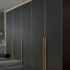 a bedroom with black walls and gold accents on the closet doors is pictured in this image