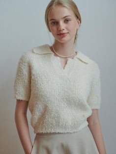 This product is a chic pear open collar knit top, offering a blend of casual elegance and comfort. The top features a delicate collar detail and short sleeves, making it a versatile piece for various occasions. Its textured knit fabric adds a touch of sophistication to the overall design. The open collar of this knit top adds a refined touch, making it suitable for both casual and smart-casual looks.Short sleeves contribute to the top's lightweight feel, perfect for transitional weather or Textured Knit, Casual Elegance, Smart Casual, Knit Top, Knit Fabric, Pear, Knitted Fabric, Overalls, Short Sleeves