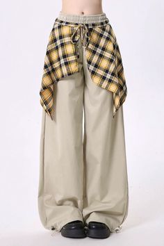 Oversized baggy trousers featuring a tied plaid shirt detail at the waist. Made for a relaxed, grunge-inspired outfit with a bold, layered design Hip Hop Pants, Oversized Pants, Tartan Skirt, Baggy Trousers, Korean Casual, Sports Trousers, Beige Fabric, Look Vintage, Skirt Design