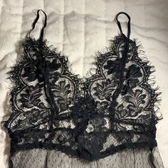 Black Lace Fashion Nova Lingerie. Never Worn. Nwot. Adjustable Straps. Button Clasp Crotch. Super Sexy! Black Underwire Camisole With Lace Trim, Black Lace Coquette Camisole, Black Lace Camisole In Feminine Style, Black Lace Camisole In Flirty Style, Black Delicate Lace Camisole For Night Out, Coquette Lace Bra For Night Out, Black Camisole With Lace Closure And Spaghetti Straps, Black Spaghetti Strap Camisole With Lace Closure, Black Lace Camisole For Night Out