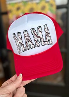 Baseball MAMA Trucker Cap Hat - Red Step up your style game with this Baseball MAMA Trucker Cap Hat. Made with high-quality materials, it provides both comfort and durability for the perfect accessory to your everyday look.   100% polyester foam front, mesh back  Structured, five-panel, mid-profile  Pre-curved visor with braid detailing  Adjustable double snapback closure  Crown height 3.5"  One size Tyler Candle Company, Baseball Mama, Crown Heights, Hat Baseball, Candle Companies, Monogrammed Items, Olive Branch, Beaded Dangle Earrings, Beaded Dangles