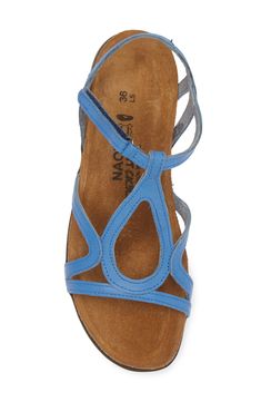 A graceful teardrop modifies a breezy T-strap sandal finished with a slim hook-and-loop strap closure. Flat sole American Podiatric Medical Association (APMA) Seal of Acceptance Leather upper and lining/rubber sole Imported Spring T-strap Sandals With Arch Support, Leather T-strap Sandals With Arch Support, Adjustable T-strap Sandals With Arch Support, Blue Leather Sandals With Arch Support, Blue Sandals With Cushioned Footbed And Single Toe Strap, Blue Sandals With Heel Loop And Single Toe Strap, Adjustable Blue Sandals With Arch Support, Blue Adjustable T-strap Sandals, T Strap Sandals