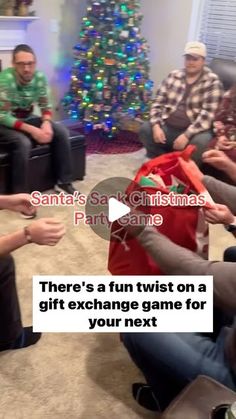 three men sitting in a living room with christmas presents on the floor and one man holding a red bag