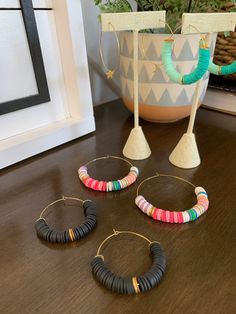 This listing is for one set of earrings. The hoop size is 45mm. Take a look around my shop for stackable bracelets to add to your look! Beads Candy, Star And Moon, Rainbow Bracelet, Bone Beads, Stackable Bracelets, Candy Stripes, Heishi Beads, Beaded Hoop Earrings, Beaded Hoops