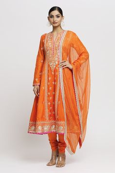 Orange anarkali with contrasting flower embroidery. Comes with churidar and embroidered dupatta. - Aza Fashions Orange Anarkali, Gopi Vaid, Women Kurta, Embroidered Dupatta, Orange Flower, Churidar, Set Women, Flower Embroidery, Set For Women