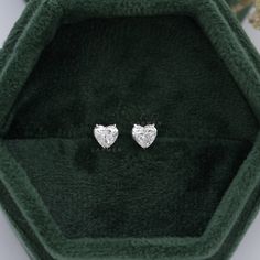 Heart Shape Diamond Stud Earrings!  *IGI Certified Lab Grown Diamonds *Total Carat Weight (TCW) = .80 *Screw back 14k white gold studs This exact pair is ready to ship, or they can be made to order if you would like to make any changes. Please send me a message with any inquiry because all of our jewelry is customizable! Diamond Heart Earrings With Prong Setting For Formal Events, Diamond Heart Earrings With Accents For Anniversary, Heart Cut Diamond Earrings In Fine Jewelry Style, Heart Cut Diamond Earrings For Fine Jewelry, Heart Cut Diamond White Earrings For Formal Occasions, Diamond White Heart Cut Diamond Earrings For Formal Occasions, Diamond Cut Heart Earrings In Fine Jewelry Style, Heart Shaped Diamond White Earrings For Anniversary, Fine Jewelry Heart Cut Diamond Earrings