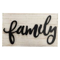 a wooden sign that says family with the word family written in cursive font