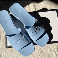 Brand New Never Worn Comes With Authentication Size 39 (9) Porcelain Blue Chic Gucci Sandals For Summer, Luxury Blue Sandals For Summer, Designer Blue Sandals For Spring, Gucci Sandals With Branded Heel Counter For Beach, Gucci Sandals For The Beach, Blue Open Toe Gucci Sandals, Designer Blue Slides For Summer, Designer Blue Slip-on Sandals, Elegant Blue Sandals For Vacation