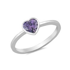 a white gold ring with a heart shaped amethorate stone in the center