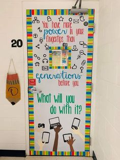 a classroom door decorated with colorful writing and pictures