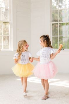 The perfect tutu outfit for your little ones birthday! Our full tutu has ten layers with a wide elastic band inside to keep the itchy tulle off your little ones' skin. The multiple soft layers give a fluffy look but lays perfectly. This tutu outfit pairs perfect with our flutter sleeve top to help bring in the celebration! Pick between our yellow tutu or light pink tutu with the age you would like!  OPTIONS AVAILABLE FOR PURCHASE:  Bodysuit/ Shirt Tutu  Tutus are perfect for birthdays, weddings, Ballerina Birthday Outfit, Playful Summer Tutu Dress With Tulle Skirt, Spring Short Sleeve Tutu Dress With Tulle Skirt, Sweet Tiered Party Skirt, Fun Spring Party Tutu Dress, Spring Party Fun Tutu Dress, Spring Party Tutu Dress, Cute Short Sleeve Tulle Tutu Dress, Cute Short Sleeve Tutu Party Dress