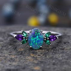 Black Opal Engagement Ring Capucinne, Luxury Black Oval Opal Ring, Luxury Black Opal Ring For Formal Occasions, Black Opal Rings, Black Opal Engagement Ring, Pink Rings, Rose Quartz Ring Engagement, Opal Promise Ring, Emerald Engagement Ring Set