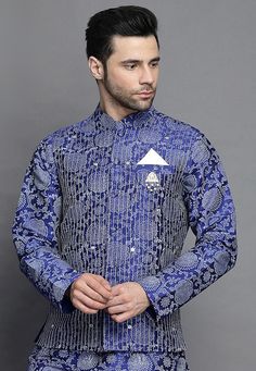 Art Silk Nehru Jacket in Royal Blue. This Readymade Sleeveless attire is Enhanced with Block Print and Resham Work. Crafted in Chinese Collar Neck. Do note: Brooch and Kurta shown in the image is for presentation purposes only. Half to one inch may vary in measurement. (Slight variation in actual color vs. image is possible). We sell all kinds of menswear. Mens Kurta | Mens Kurta Pajama | Mens Sherwani | Mens Sherwani Sets | Traditional Menswear | Partywear Menswear | Indian Mens Dresses | Diwal Blue Nehru Jacket With Zari Work For Festive, Traditional Blue Nehru Jacket For Festive Occasions, Festive Blue Nehru Jacket With Zari Work, Festive Blue Designer Nehru Jacket, Festive Blue Nehru Jacket For Designer Wear, Formal Blue Embroidered Outerwear, Festive Blue Nehru Jacket, Festive Blue Bandhgala With Long Sleeves, Blue Long Sleeve Bandhgala For Festive Occasions