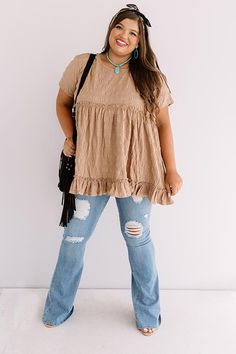 Plus Size -     All eyes will be on you when you wear out flirty iced mocha colored "Kisses In Capri" top featuring lightweight material with subtle crinkled texturing, a high rounded neckline, short loose sleeves, a fitted bodice with smocked detailing, and a relaxed babydoll silhouette that falls into an uneven ruffled tunic length hemline!     Measurements XL :  Bust 50", Hip 56", Length 30", Sleeve Length 6.5", Waist 52".  1XL :  Bust 52", Hip 58", Length 31", Sleeve Length 6.5", Waist 54". Curvy Boho, Disneyland Princess, Iced Mocha, Summer Spring Outfits, Ruffled Tunic