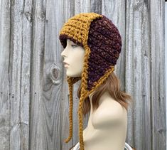 Crochet Hat Style: Wanderlust Trapper Hat - a chunky crochet ear flap hat for women, men and teens. Color: This sample hat is shown in Flax and Harvest, a mix of Deep Eggplant mixed with Clay, Tangerine, Sunflower Yellow.  Sizes: One size fits 20" to 23" (50.5 cm to 58 cm) head size. Fiber Content: 80% acrylic, 20% Wool Characteristics: Very soft, warm and cozy.  Care Instructions: Hand wash, dry flat.  Every item from Pixiebell is handmade and knit or crocheted to order, unless otherwise stated Aviator Cap, Chunky Crochet Hat, Cap Crochet, Bonnet Au Crochet, Flap Hat, Earflap Hat, Ear Flap Hats, Mens Hat, Bonnet Crochet