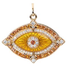 ♥ A solid 18K gold evil eye pendant featuring gorgeous princess-cut orange sapphires and diamonds ♥ This pendant features an inner halo of guilloche enamel ♥ The pendant is hung from a special chain necklace made up from the most unique long marquise-shaped eye and star links ♥ The clasp is a diamond-studded spring gate sailor clasp. Add a pendant in the clasp, or simply wear the clasp at the front as the focal point ♥ The pendant measures 24mm in length not including the bail, 31mm in width, an Fine Jewelry Enamel With Diamond Accents, Enamel Jewelry With Diamond Accents, Orange Jewelry With 17 Jewels As A Gift, Orange Diamond Gemstone Jewelry, Orange Diamond Jewelry As A Gift, Luxury Diamond Jewelry With Evil Eye Detail, Orange Diamond Jewelry With Diamond Accents, Yellow Enamel Pendant Jewelry, Luxury Enamel Jewelry With Detachable Pendant