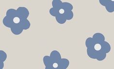 blue flowers on a gray background with white dots in the middle and one flower at the center