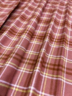 ---Description--- *Multiple yards are cut continuously  (EX: (1) 1/2 yard and (3) yards will be cut as 3.5 continuous yards) *Fabric Pattern: Salmon Color w/ Hints of Yellow/White/Rust *Flannel is a soft, light to medium weight, woven fabric with zero stretch. This flannel is made with 100% cotton. With its insulating properties it is great for outerwear, shirts, shorts, pajamas, bedding, scarves, and much more!  ---Product Highlights--- *Zero Stretch  *Width 58/60 *Medium Weight ---Care--- *Pre Plaid Laminated Raincoat Fabric By The Yard, Plaid Fabric For Sale, Plaid Wool Fabric, Shorts Pajamas, Pink Plaid Pattern Fabric, Flannel Fabric By The Yard, Plaid Flannel Fabric, Salmon Color, Flannel Fabric