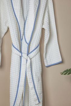 The Waffle Weave towel is now available in a robe. The Waffle Weave Robe has a light and airy waffle weave texture. Perfect for lounging after a shower or bath. These waffle weave robes will have you feeling like you're on vacation at a 5 star resort and spa. Don't forget to try our spa slippers to create the whole vibe. Details: 100% Turkish Cotton Mid-length Women's sizing - fits true to size. 5 Star Resort, Spa Slippers, Bath Robes For Women, Waffle Weave Towels, Bath Robes, Wool Dryer Balls, Resort And Spa, Women's Robe, White Coral