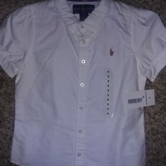 New With Tag Ralph Lauren Girls Short Sleeve Shirt. Button-Down. White. Size 5 Cute White Button Shirt, Cute White Button-up Shirt, Cute Fitted Shirt With Buttons, Ralph Lauren Spring Button-up Top, Cotton School Top With Buttons, Fitted Cute Ralph Lauren Tops, School Button-up Cotton Tops, Cute Ralph Lauren Summer Tops, Cute Fitted Ralph Lauren Tops