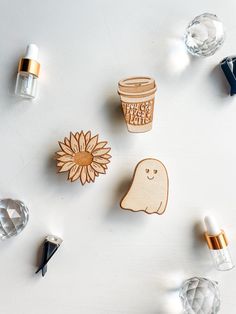 various items are arranged on a white surface, including an object that says happy mother's day