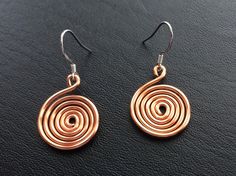 Thick Copper Wire Spiral Earrings on Sterling by ChandlersDezigns Simple Wire Earrings, Rose Gold Spiral Earrings With Ear Wire, Spiral Copper Wire Earrings As Gift, Wire Wrapped Spiral Earrings In Silver Plated Wire, Spiral Copper Wire Jewelry With Ear Wire, Spiral Wire Earrings With Ear Wire, Spiral Wire Wrapped Silver Plated Earrings, Unique Handmade Spiral Earrings, Silver Plated Wire Wrapped Spiral Earrings