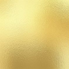 a close up view of a shiny gold surface