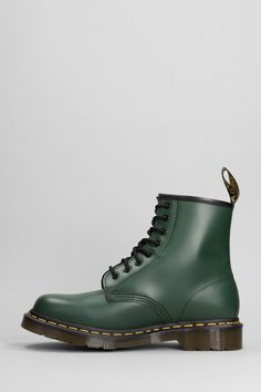 Upper: 100% Leather Outsole: 100% Rubber | Dr. Martens Men's 1460 Combat Boots in Green | FW23/24 Leather Snip Toe Work Boots For Streetwear, Leather Boots With Rubber Sole For Streetwear, Plain Toe Leather Work Boots For Streetwear, Leather Work Boots With Plain Toe For Streetwear, Green Leather Combat Boots For Outdoor, Leather Work Boots For Streetwear, Classic Leather Work Boots For Streetwear, Green Leather High-top Boots, Green High-top Leather Boots