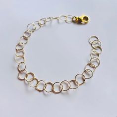 This delicate bracelet is made using a delicate and decorated filigree chain in Italian Sterling Silver 925, 9k Gold plated. The size will be made to order to suit you perfectly so please do not forget to select your size ✨ Every piece of jewellery is unique and made to order and it comes with a sustainable gift box 🌱 💝 Sterling Silver Delicate Chain Bracelet, Delicate Sterling Silver Round Chain Bracelet, Delicate Sterling Silver Chain Bracelet, Elegant Handmade Brass Chain Bracelet, Yellow Gold Sterling Silver Chain Bracelet With Lobster Clasp, Dainty Gold Sterling Silver Bracelet For Everyday, Yellow Gold Sterling Silver Bracelet, Gold Delicate Chain Bracelet With Lobster Clasp, Gold Sterling Silver Chain Bracelet With Lobster Clasp