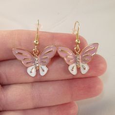 These Beautiful Pink Rhinestone Crystal Butterfly Earrings Are Gold Plated, Hand Oil Painted, And Are On Hypoallergenic Hooks That Will Not Hurt Your Ears. Brand New, Handmade, And Never Been Worn. Lead And Nickel Free. Rubber Backs Included. These Fine Quality Earring Are Perfect For All Day, Everyday Wear Or A Special Gift. Get An $18 Gift Of Your Choice In My Listings With Purchase Of Two Or More Items. Please Send Offers And Questions. Charms: 26x20mm Or 1.02" X.78" Hand Oil, All Day Everyday, Crystal Butterfly, Gold Crystal, Pink Rhinestones, Butterfly Earrings, Special Gift, Crystal Rhinestone, Special Gifts