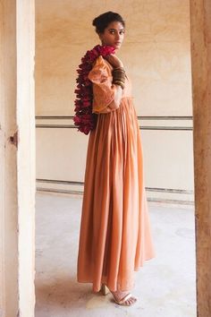 Rusting orange pleated maxi dress with tonal floral embroidery on the sleeves. - Aza Fashions Festive Maxi Dress With Embroidered Sleeves, Traditional Summer Dresses With Gathered Sleeves, Festive Wedding Dress With Gathered Sleeves, Wedding Maxi Dress With Pleated Sleeves, Floor-length Dresses With Gathered Sleeves, Orange Floral Embroidered Dress For Wedding, Festive Orange Maxi Dress For Wedding, Orange Floral Embroidered Wedding Dress, Festive Orange Floor-length Maxi Dress