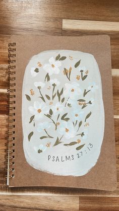 a brown notebook with white flowers and the words, palms 21 - 31 on it