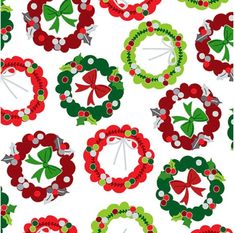 a bunch of wreaths with bows and bells on them, all in different colors