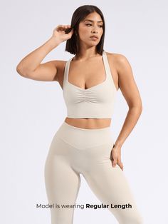 Karma Crop - Bone Beige Stretch Sports Bra With Built-in Bra, White Fitted Yoga Bra, Fitted White Nylon Bra, White Fitted Nylon Bra, High Stretch Nylon Sports Bra With Removable Pads, Stretch Push-up Bra For Yoga, Stretch Push-up Yoga Bra, White Fitted Sports Bra With Removable Pads, Fitted White Sports Bra With Removable Pads