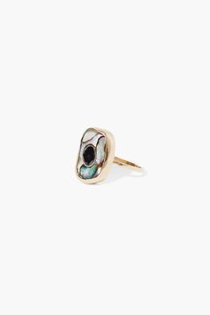 A variation on our classic 14k Oasis Ring featuring abalone shell with an inlaid black diamond slice. This piece is one of a kind so size and shape may vary. 14k yellow gold, .2ct black diamond slice, abalone. Abalone stone: 10mm x 16mm Diamond: 5mm-6mm Handmade in Vietnam. Luxury Gold Jewelry With Abalone Shell, Gold Abalone Shell Round Jewelry, Bohemian Abalone Shell Jewelry, Oasis Style, Ocean-inspired Abalone Shell Jewelry, Bohemian Abalone Shell-shaped Jewelry, Abalone Shell, Classic Ring, Diamond Sizes