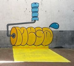 a painting on the side of a building that has yellow paint and a blue pipe coming out of it