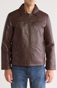 A wind- and water-resistant jacket constructed from smooth faux leather features a quilted lining and multiple pockets for timeless appeal. 27" length (size Medium) Front zip closure Point collar Chest zip pockets; front welt pockets Lined, with synthetic fill 100% polyurethane Machine wash, line dry Imported Classic Leather Jacket With Zipper Closure For Outdoor, Classic Leather Jacket With Zipper For Outdoor, Classic Faux Leather Outerwear For Winter, Casual Faux Leather Outerwear With Zip Fly, Collared Faux Leather Outerwear With Pockets, Collared Faux Leather Jacket With Pockets, Faux Leather Outerwear With Pockets, Classic Leather Outerwear With Faux Front Pockets, Classic Weatherproof Outerwear