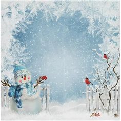 a snowman sitting in the middle of a snowy forest with red birds on it