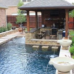 an image of a backyard with a pool and gazebo