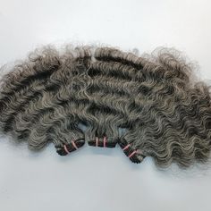 Curly Grey Indian Human Hair Extensions - 3 Bundle deal Grey salt and pepper human hair combo bundle deals. raw grey human hair extensions  We offer the best combo bundle deals on Grey - Salt and Pepper Human Hair Bundles, like 3 bundles deals. Combos like  - Eg: 12 Inch, 14 Inch, and 16 inch  Bundle deals of Raw unprocessed Grey human hair extensions.   100% Unprocessed human hair. We sourced from temples in India. Natural Grey (Salt and pepper) human hair. Natural Texture free from chemicals.  Cuticle-aligned Single donor human hair. Free from lice and nits.  The Deal contains 300 grams each bundle weighs 100 grams.  Machine-weft double wefts ensure no shedding.  3 bundles will be good enough for a full head and give you a volumized   Deal Combinations are available from 12 inches to 24 Grey Extensions, Gray Hair Extensions Grey Silver, Grey Hair Extensions, Raw Hair Bundles, Grey Curly Hair Wigs & Hair Extensions, Going Gray Gracefully, Indian Human Hair, Going Gray, Hair Bundles