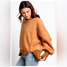 Brown Relaxed Fit Sweater For Loungewear, Comfy Brown Tops For Loungewear, Comfy Beige Tops For Fall, Oversized Brown Sweatshirt For Layering, Brown Top With Ribbed Cuffs For Fall, Cozy Fit Brown Tops For Loungewear, Brown Tops With Ribbed Cuffs For Fall, Brown Crew Neck Sweater For Loungewear, Beige Cozy Fit Top