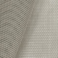 white fabric textured with small squares on the top and bottom, as well as an image