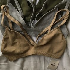 This Nwt Set Of Three Free People Lingerie Bra Dress Is Perfect Under Teeshirts And Wearing To Bed . The Size Is A M/L And Very Stretchy. This Bralettes Has Never Before Worn And Has All It Tags On It. Price Might Look High Im Up For Offers. Purchase Will Come With Three Suprise Free Gift. Message For More Details. Thank You Comment For Questions Stretch Low-cut Bra For Loungewear, Fitted Beige Bra For Loungewear, Spring Casual Loungewear Bra, Casual Spring Loungewear Bra, Spring Camisole Bra For Loungewear, Spring Loungewear Camisole Bra, Casual Loungewear Bra, Stretch Triangle Top For Loungewear, Cute Bra And Under Set