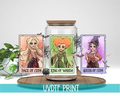 three cards in a jar with the names of different characters on them and an image of a witch holding a broom