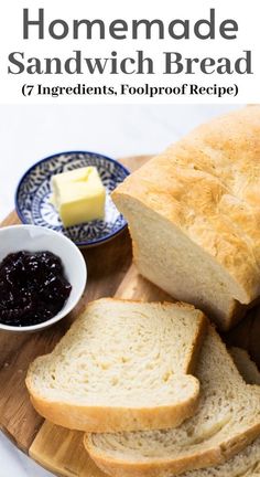 homemade sandwich bread on a cutting board with butter and jam