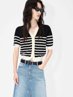 MO&Co. Women's Short Sleeve Contrast Cardigan This classic black and white striped cardigan features a stylish v-neck and puff sleeves. The front is decorated with a row of beautiful buttons, making it a fashionable piece that can be styled for any occasion. Features : - Classic black and white stripes- Puff sleeve and short sleeves- V-neck with buttons along the front Code: MBC2CAR011The back length of size S is 51.5cmMATERIALS & CARE Material: 82.7% Cotton 17.3% PolyamideOur sizes might be a l Striped V-neck Cardigan For Work, Striped Cardigan For Workwear, Chic Striped Cardigan For Spring, Striped V-neck Cardigan For Spring, Contrast Cardigan, Beige Cardigan, Striped Cardigan, Black Cardigan, Puff Sleeves